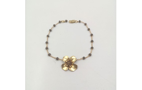 Pulsera facetadas gris y flor oro
