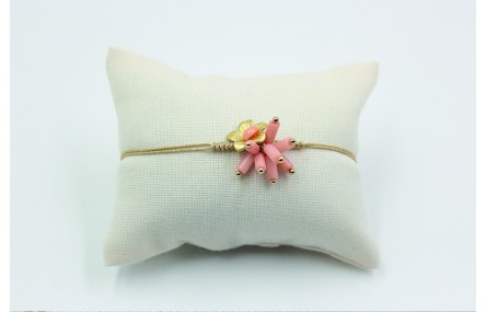 Pulsera nudo serpiente en color oro palido con cor