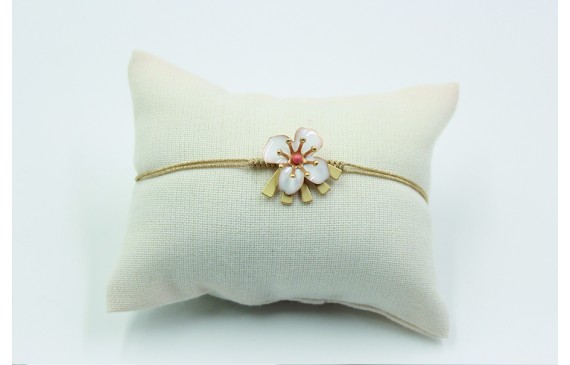 Pulsera nudo serpiente en color oro palido con flo