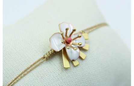 Pulsera nudo serpiente en color oro palido con flo