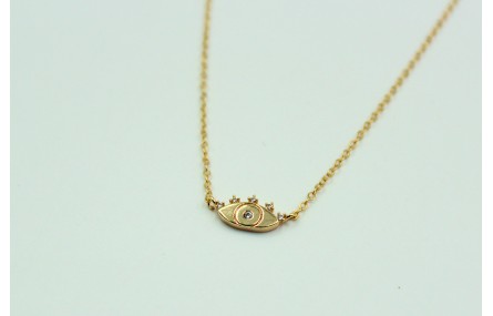 Solitario ojo turco con brillos de cristal en lató