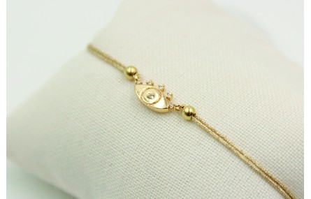 Pulsera de macrame en color oro palido y ojo turco