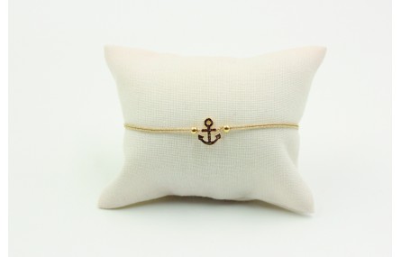 Pulsera de macrame en color oro palido y ancla dor