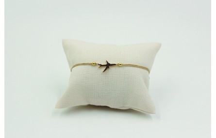 Pulsera de macrame en color oro palido y avión dor