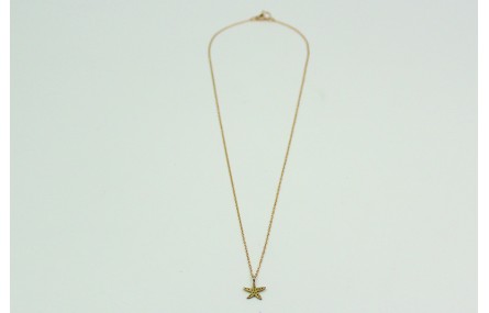 Solitario con cadena de eslabón pequeño dorado y c