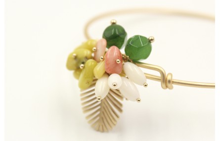Pulsera rigida en oro mate con hoja de palmera y s