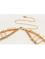 Gargantilla con coralitos entrepiezas en oro mate 