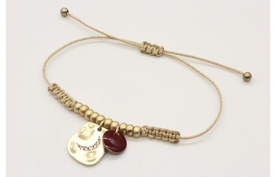 Pulsera macrame oro palido con bolas oro mate y co