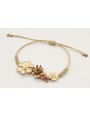 Pulsera nudo serpiente oro palido con trio de flor