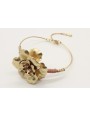 Pulsera rigida con lentejuela rosa y flor central 