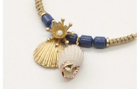 Pulsera nudo serpiente en oro palido con piedras a