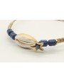 Pulsera rigida con macrame dorado palido, caracola
