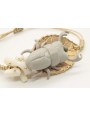 Pulsera hilo macrame oro palido con escarabajo gri