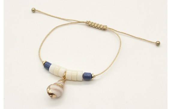 Pulsera hilo macrame oro palido con corales blanco