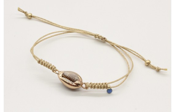 Pulsera nudo serpiente oro palido con caracola bor