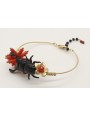 Pulsera rigida con escarabajo esmaltda negro, tubo