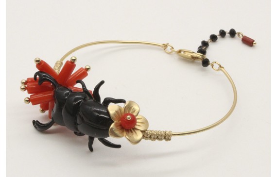 Pulsera rigida con escarabajo esmaltda negro, tubo