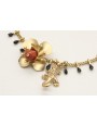 Pulsera cadena cerillas negras con flores oro mate