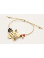 Pulsera hilo macrame oro palido con flor oro mate,