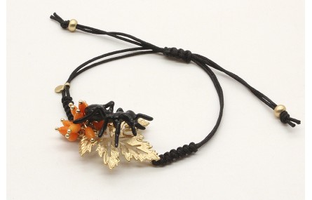 Pulsera nudo serpiente negra con hoja calada oro, 