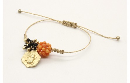 Pulsera macrame oro palido con bola corales, burru