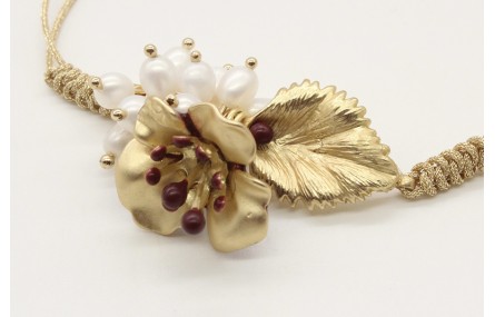 Pulsera nudo serpiente en oro palido con hoja, flo