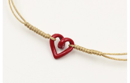Pulsera nudo serpiente dorado con corazón hueco ro