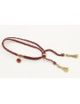 Pulsera trenzada hilo rojo vivo y oro con chapa co