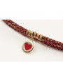 Pulsera trenzada hilo rojo vivo y oro con chapa co