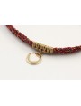 Pulsera trenzada hilo rojo vivo y oro con chapa co