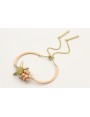 Pulsera semirigida con bolas rositas, estrella oro