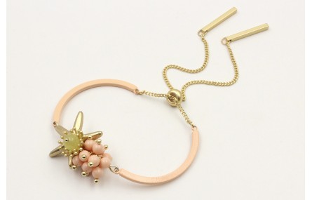 Pulsera semirigida con bolas rositas, estrella oro