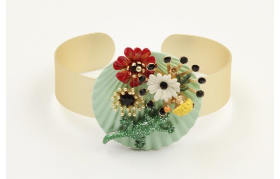 Pulsera rigida con disco ondulado turquesa  flores
