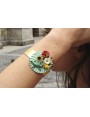Pulsera rigida con disco ondulado turquesa  flores
