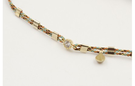 Pulsera macrame rosa,azul y oro con nudo en color 