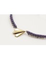 Pulsera macrame morado con bolitas doradas y avión