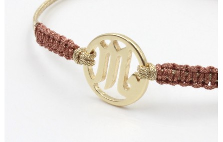 Pulsera hilo macrame oro palido con nudo oro rosa 