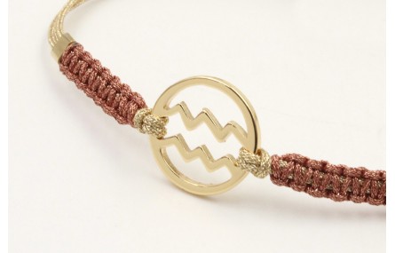 Pulsera hilo macrame oro palido con nudo oro rosa 