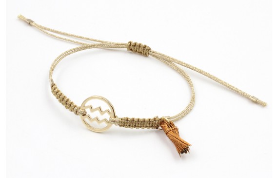 Pulsera hilo macrame oro palido con nudo dorado di