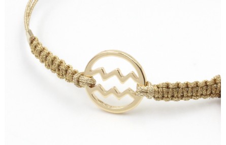 Pulsera hilo macrame oro palido con nudo dorado di