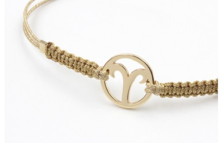Pulsera hilo macrame oro palido con nudo dorado di