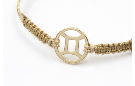 Pulsera hilo macrame oro palido con nudo dorado di