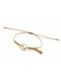 Pulsera hilo macrame oro palido con nudo dorado di