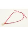 Collar seda color rosa fuerte con colgante caracol