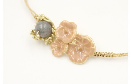 Pulsera nudo serpiente oro pálido con centro trio 