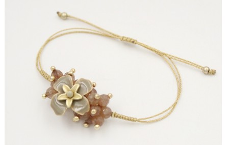 Pulsera nudo serpiente oro palido con burruño face