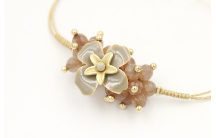 Pulsera nudo serpiente oro palido con burruño face