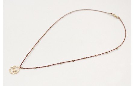 Solitario con hilo micro driza granate,oro con col