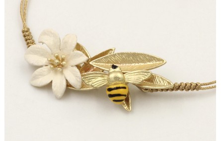 Pulsera hilo dorado palido con nudo serpiente, flo