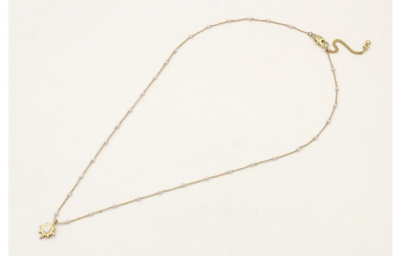 Solitario de cadena con perlas y colgante estrella